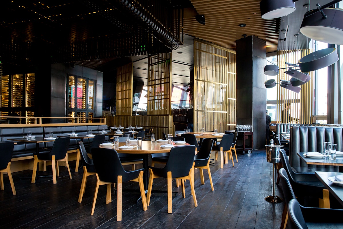Chef preparing seasonal dish at Chambers